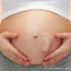 妊娠9か月の妊婦のお腹